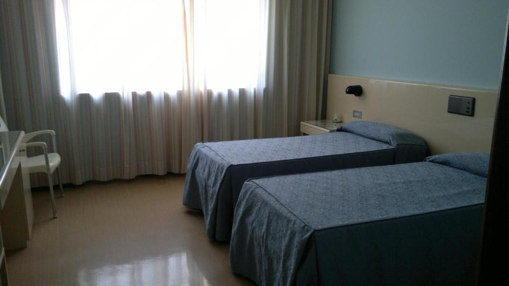 Albergo Casa Dell'Ospite เบรเชีย ห้อง รูปภาพ